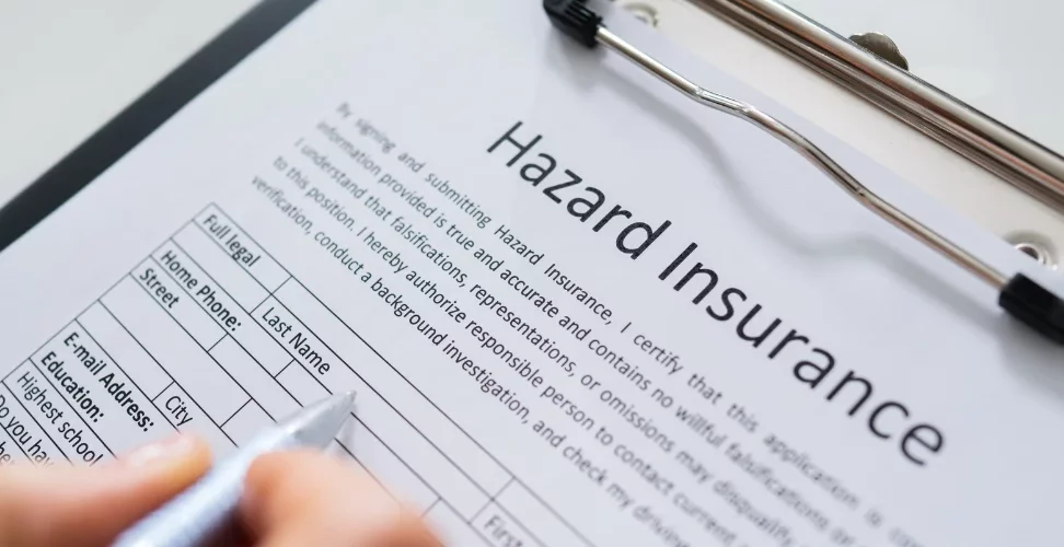 A person signing up for Hazard insurance